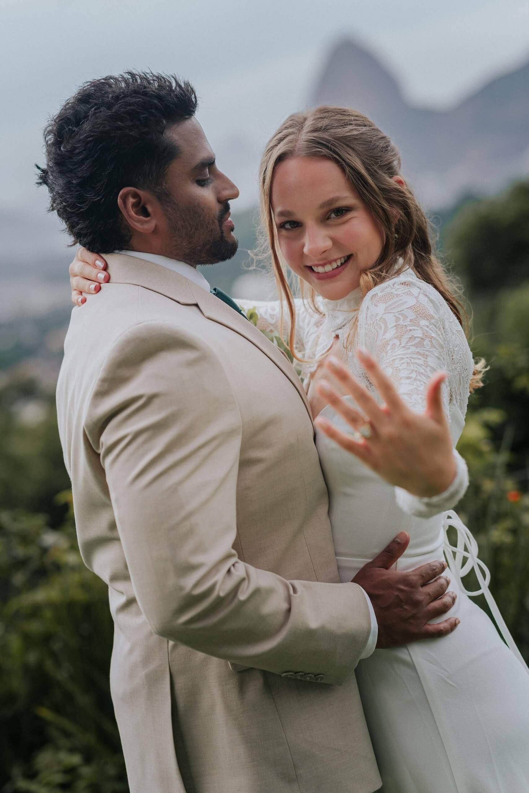 Engagement in Rio de Janeiro, romantic couple celebrating love at Brazil’s iconic destination wedding location with Sugarloaf Mountain view.