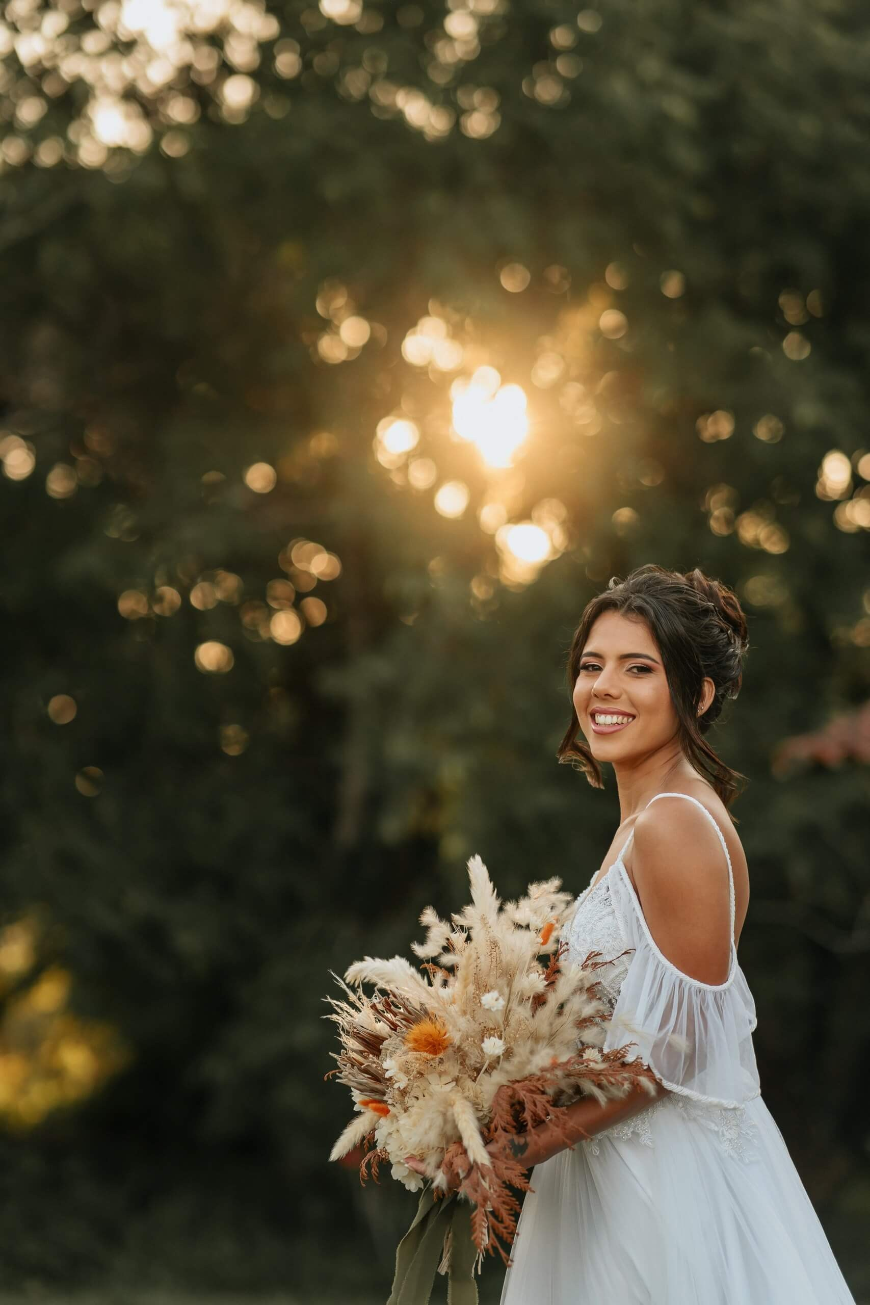 Bride holding bouquet at destination wedding in Rio de Janeiro, romantic Brazil wedding photography.